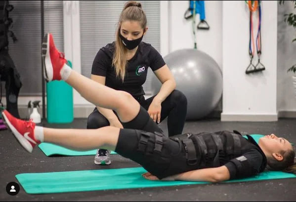 Wireless Smart EMS Fitness Suit – Removable Electro Muscle Stimulator for Back Pain Relief & Weight Loss